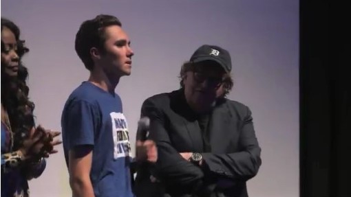 Image result for images of david hogg with michael moore