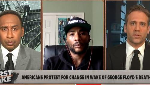 First Take co-hosts Stephen A. Smith (left) and Max Kellerman (right) flank guest Lenard McKelvey