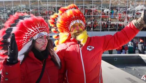 KC Chiefs fans wearing headdresses