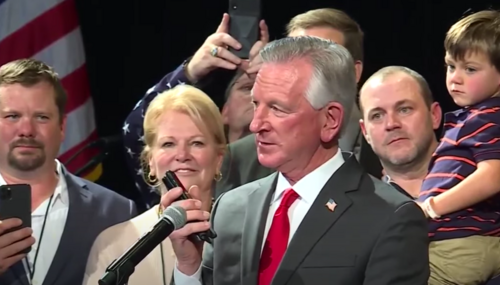 Sen. Tommy Tuberville, center