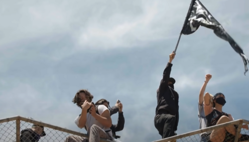 BLM protestors on a bridge 