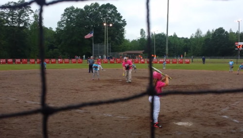 A softball game that a kid like AM would be playing in