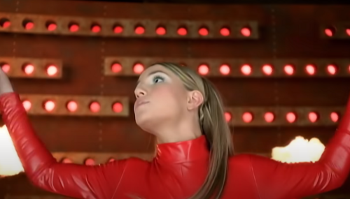 Britney Spears in her music video, "Oops! I did it again"