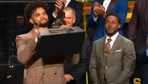 Caleb Williams hoisting Heisman Trophy Caleb Williams, 2022 Heisman Trophy winner