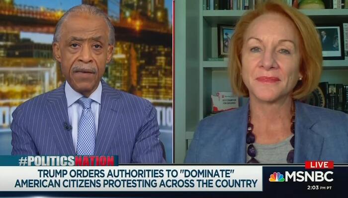 Al Sharpton and Jenny Durkan